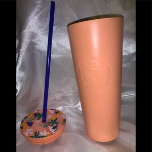 Matte peach Starbucks tumbler with floral lid